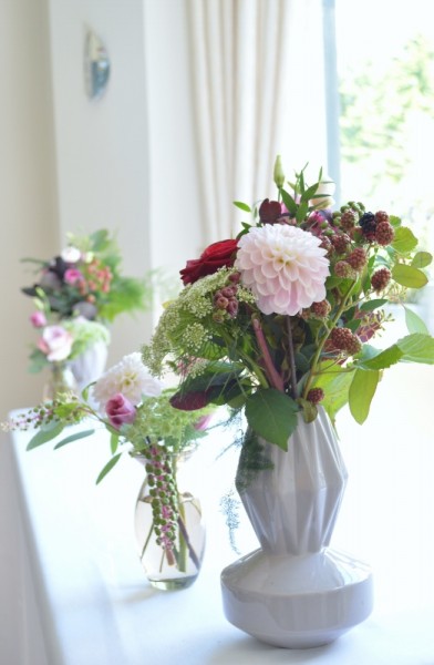 geometric vases of flowers