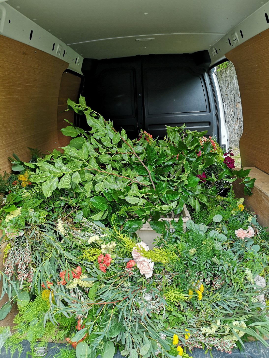 wedding florist van packed full of flowers 