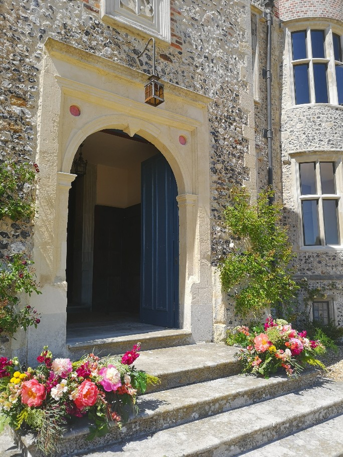 Flowers on the steps ready for bride and groom confetti shot