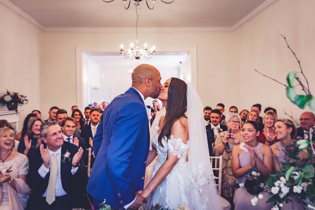 Pelham House October Wedding, bride and groom first kiss