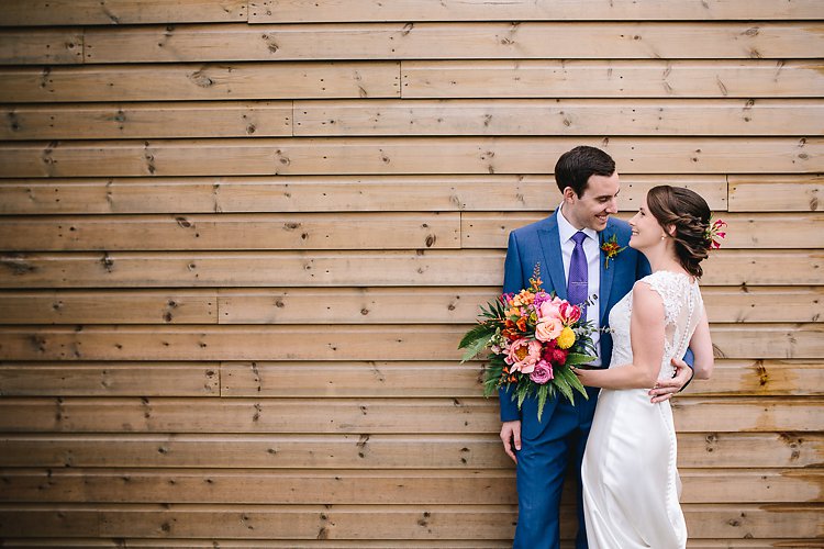 bride and groom at chafford park colourful wedding