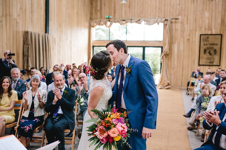 bride and groom at chafford park colourful wedding ceremony