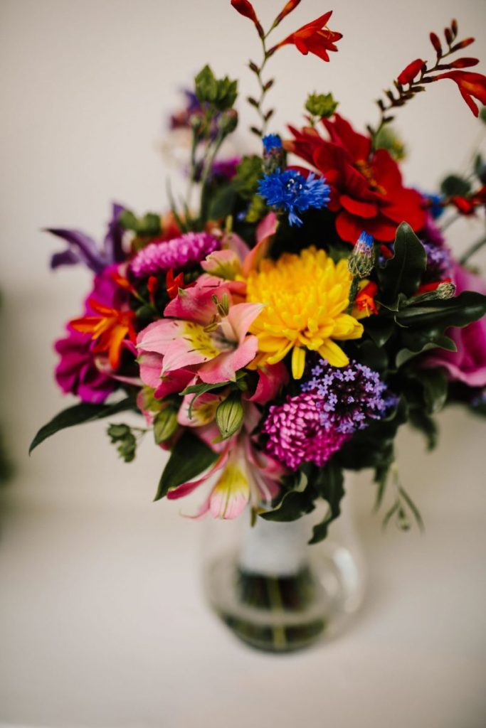 vibrant colourful bridal bouquet at Brighton music hall